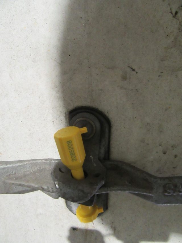 Numbered security seal on a reefer container door